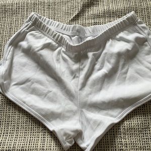 American Apparel white running shorts, size Large